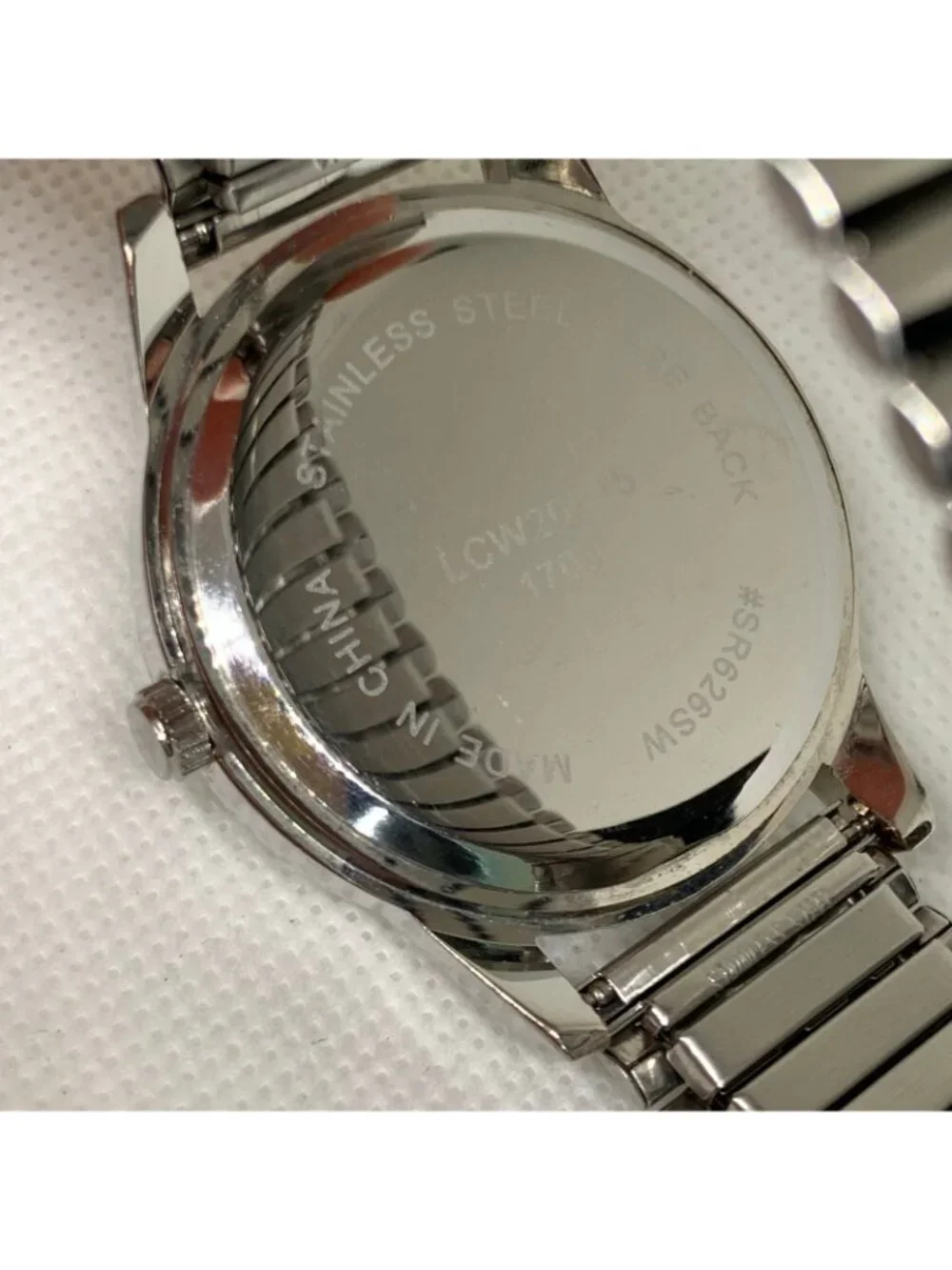 L&Co silver tone men’s watch 40mm quartz analog stretch band 7.5” running